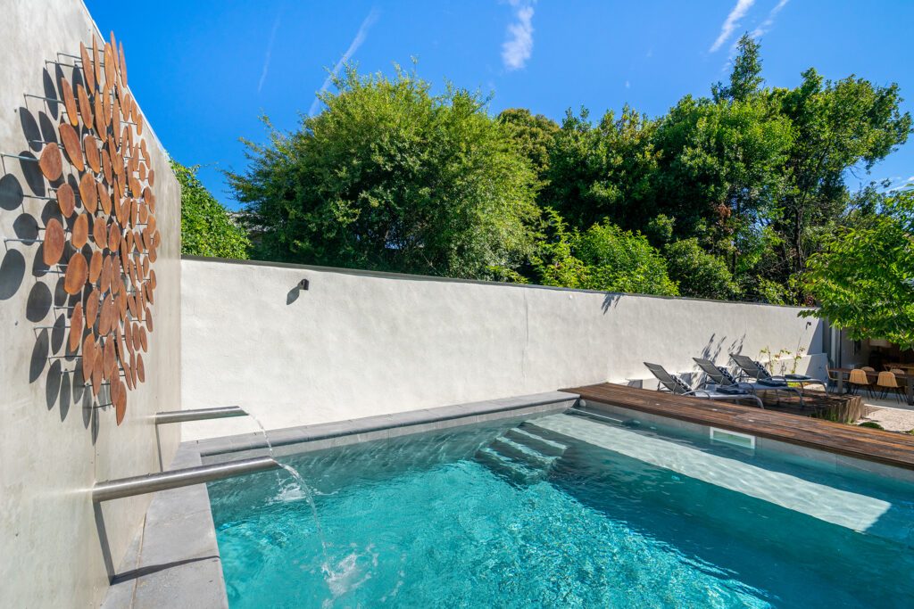 Canto de Luz heated pool with water feature in the garden