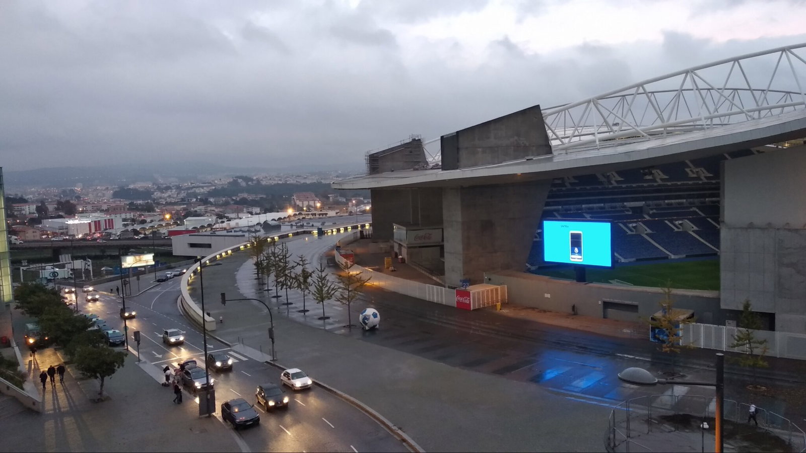 Est&aacute;dio do Drag&atilde;o with its blue seating and the city of Porto beyond