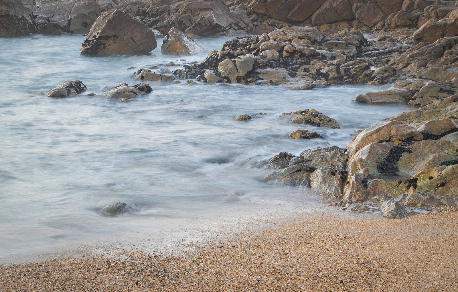 The beach and rocks below the Castelo do Queijo fort in Porto