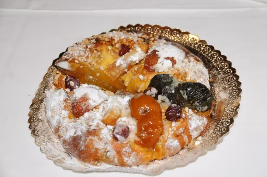 A Bolo-Rei, the Portuguese Christmas king cake topped with crystallised fruit and nuts