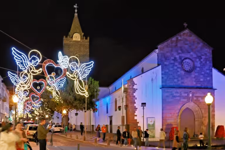 Christmas angel lights beside Funchal Cathedral in Madeira at night