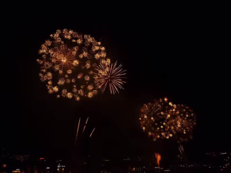 Fireworks bursting over Porto at night