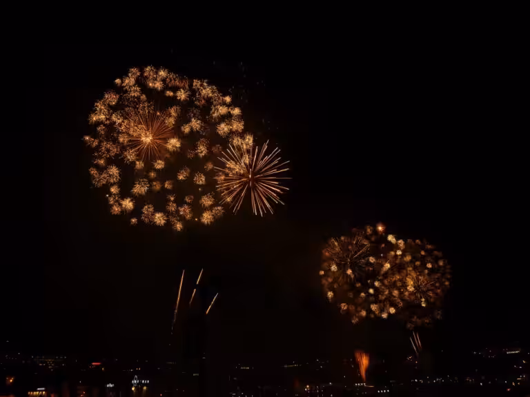 Fireworks bursting over Porto at night
