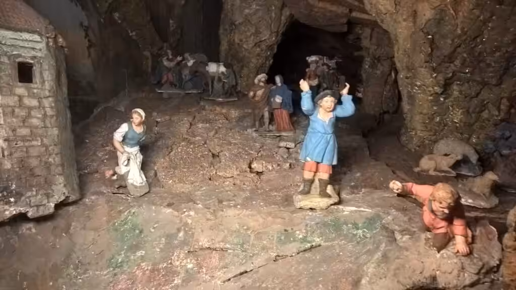 Terracotta figures in the historic presepio nativity scene at the Basilica da Estrela in Lisbon